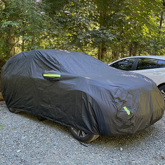 bache voiture sous ombre voiture blanche